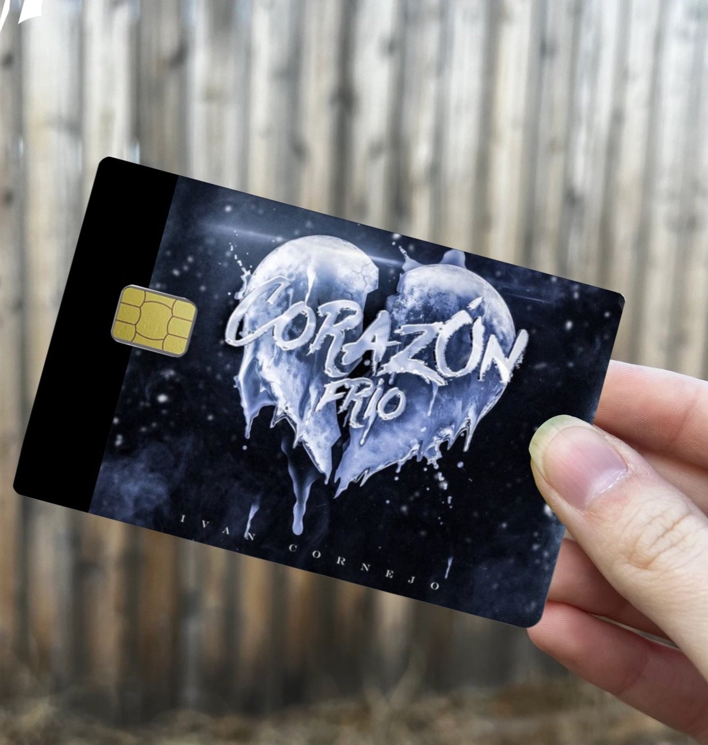 Corazón Frío themed credit card cover with icy broken heart design and dark galaxy background, standard credit card size