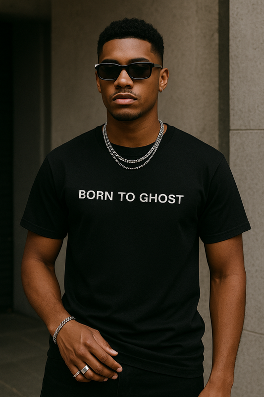 Black t-shirt with white ‘Born to Ghost’ quote, worn by stylish Black male model in sunglasses and jewelry. Funny viral men’s graphic shirt.