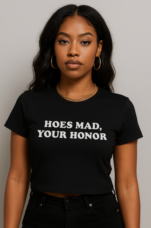 Stylish Black woman wearing black crop top with white text that says ‘Hoes mad, your honor’ – Y2K aesthetic graphic tee
